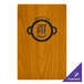 A wood surface with a logo on it.