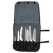 A Mercer Culinary Millennia® 8-piece knife set in a white roll bag.