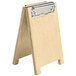 A natural wood menu board tent with a metal clip.