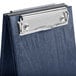A denim wood table tent with a metal clip.