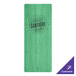 A teal wood menu board with black text on a table.
