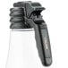 A black polypropylene bottle with an orange "Italian" print and black handle.