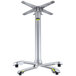 A silver metal FLAT Tech table base with wheels.