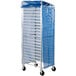 A Curtron bun pan rack with a blue mesh cover.