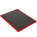 A black wood menu board with a red border on a table.