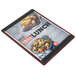 A Menu Solutions mahogany wood menu board on a table with a picture of food on it.