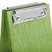 A lime wood menu board tent with a silver metal clip.