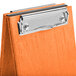 A Menu Solutions Mandarin wood clipboard tent with a metal clip.