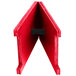 A berry wood menu board tent with a black clip.