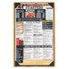 A Menu Solutions country oak wood menu board with picture corners on a counter with a menu of wings and beer.