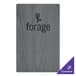 A grey wooden Menu Solutions board with a black logo on it.