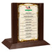 A Menu Solutions walnut wood table tent with an insert slot on a table.