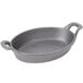 An American Metalcraft pre-seasoned cast iron oval casserole dish with handles.