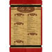 A Menu Solutions wood menu board with a red rubber band straps.