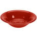 A red Fiesta china bowl with a white background.