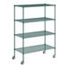 A green metal wire shelving unit with wheels.