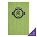 A green wood menu board with a black logo on it.
