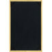 A wooden menu board with black picture corners on a table.