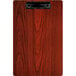 A Menu Solutions mahogany wood clipboard with a wood grain.