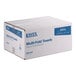 A large cardboard box containing 4,000 Lavex white multi-fold towels.