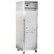 A silver Continental Reach-In Refrigerator with half doors and wheels on a white background.
