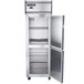 A Continental reach-in refrigerator with two solid half doors.