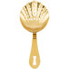 A close-up of a gold-plated Barfly scalloped julep strainer with holes.