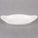 A white oval shaped Hall China rarebit dish.