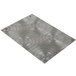 A Menu Solutions Alumitique aluminum menu board with circular metal rings on it.