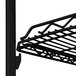 a close-up of a black metal shelf