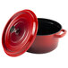 A red GET Heiss cast aluminum round Dutch oven with a lid.