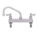 A stainless steel Fisher deck-mounted faucet with lever handles.