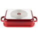 A red and white rectangular roasting pan with a lid.