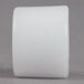 A white cylinder with a white plastic wheel.