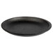 A Valor pre-seasoned cast iron fajita skillet with a white background.