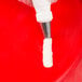 A hand holding an Ateco pastry bag with a shell piping tip.