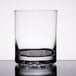 A close up of a clear Libbey Nob Hill rocks glass with a reflection.