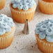 Cupcakes with Ateco open star piped frosting on top.