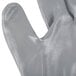 A close up of a white Cordova glove with gray nitrile coating on the palm.