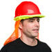 A man wearing a Cordova red hard hat with orange mesh.