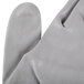 A pair of grey Cordova Cor-Touch Lite gloves with gray polyurethane palms.