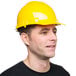 A man wearing a yellow Cordova Duo hard hat.