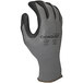 A close-up of a Cordova Conquest gray and black warehouse glove.