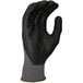 A gray and black Cordova Conquest warehouse glove with a gray palm.
