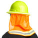 A construction worker wearing a Cordova Hi-Vis green hard hat and reflective vest.