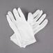 A pair of white Cordova Women's Stretch Nylon Inspector's Gloves.