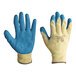 A pair of extra large yellow and blue Cordova Power-Cor gloves with blue rubber palms.