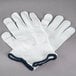 A pair of Cordova white nylon work gloves with blue trim.