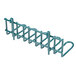 A green Metro Smartwall G3 utensil holder with many holes in it.