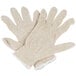 A pair of beige Cordova work gloves.